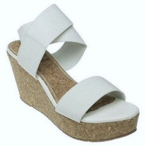 white volatile sandals